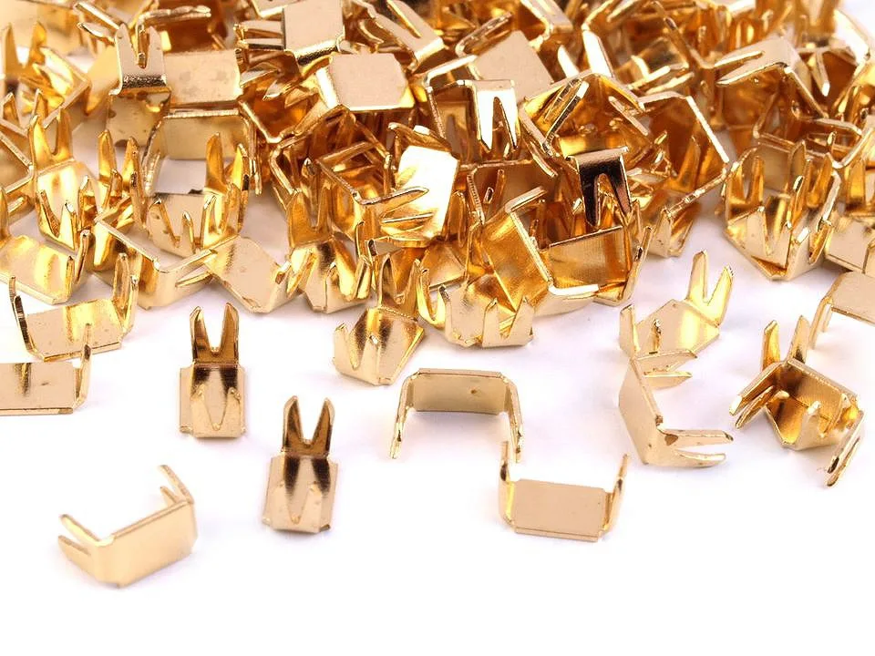 Endstücke für Reißverschlüsse Gold, Nahaufnahme
