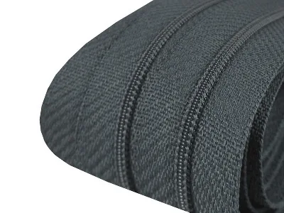 Reißverschluss als Meterware in Dunkelgrau, spiralförmig, mit 3 mm Spiralbreite