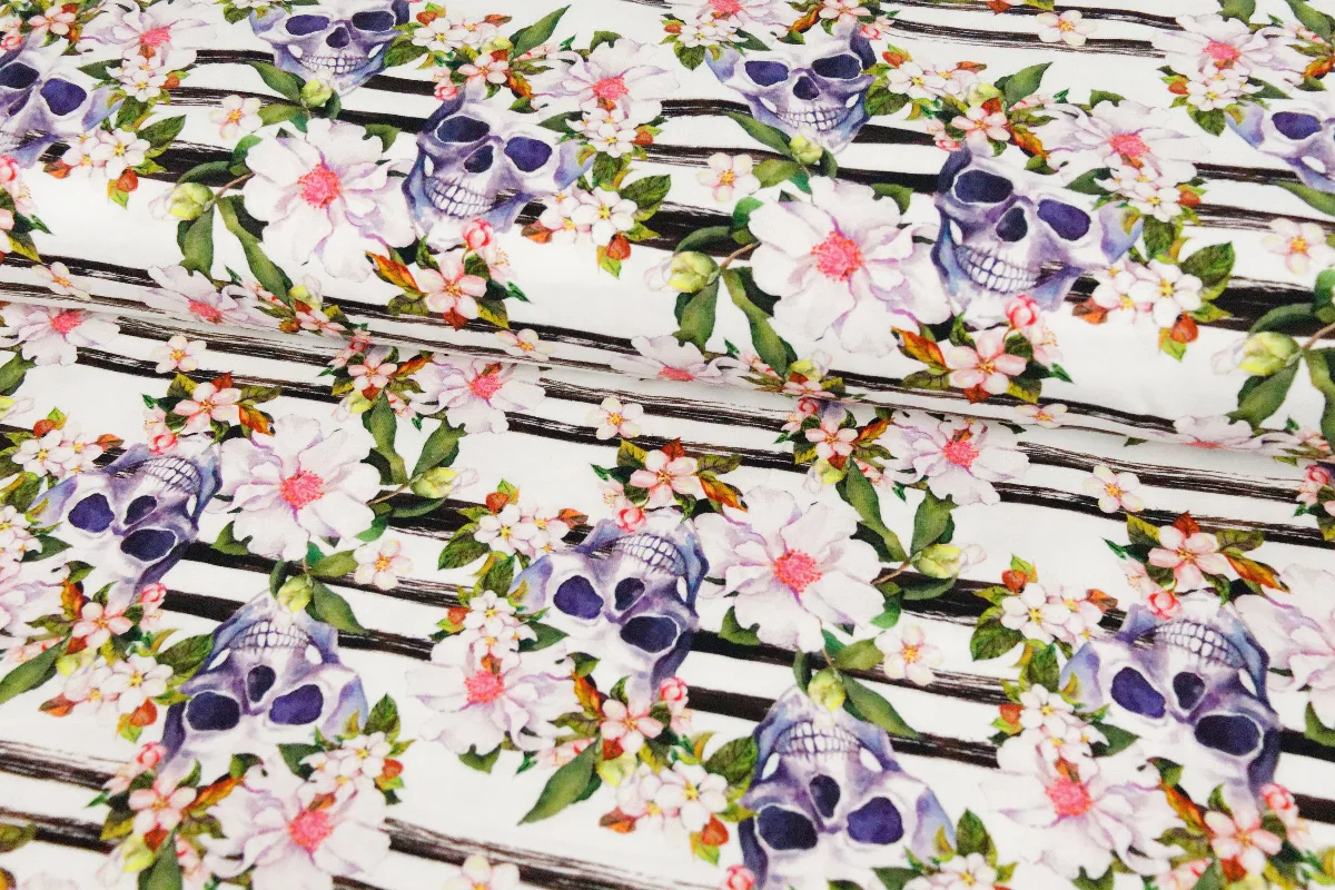 Baumwolljersey Blüten in Bunt auf Weiß, Meterware im Detail