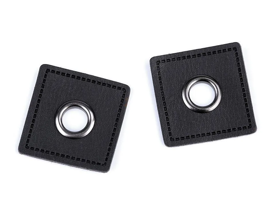 Ösen-Patches in Schwarz, Nahaufnahme