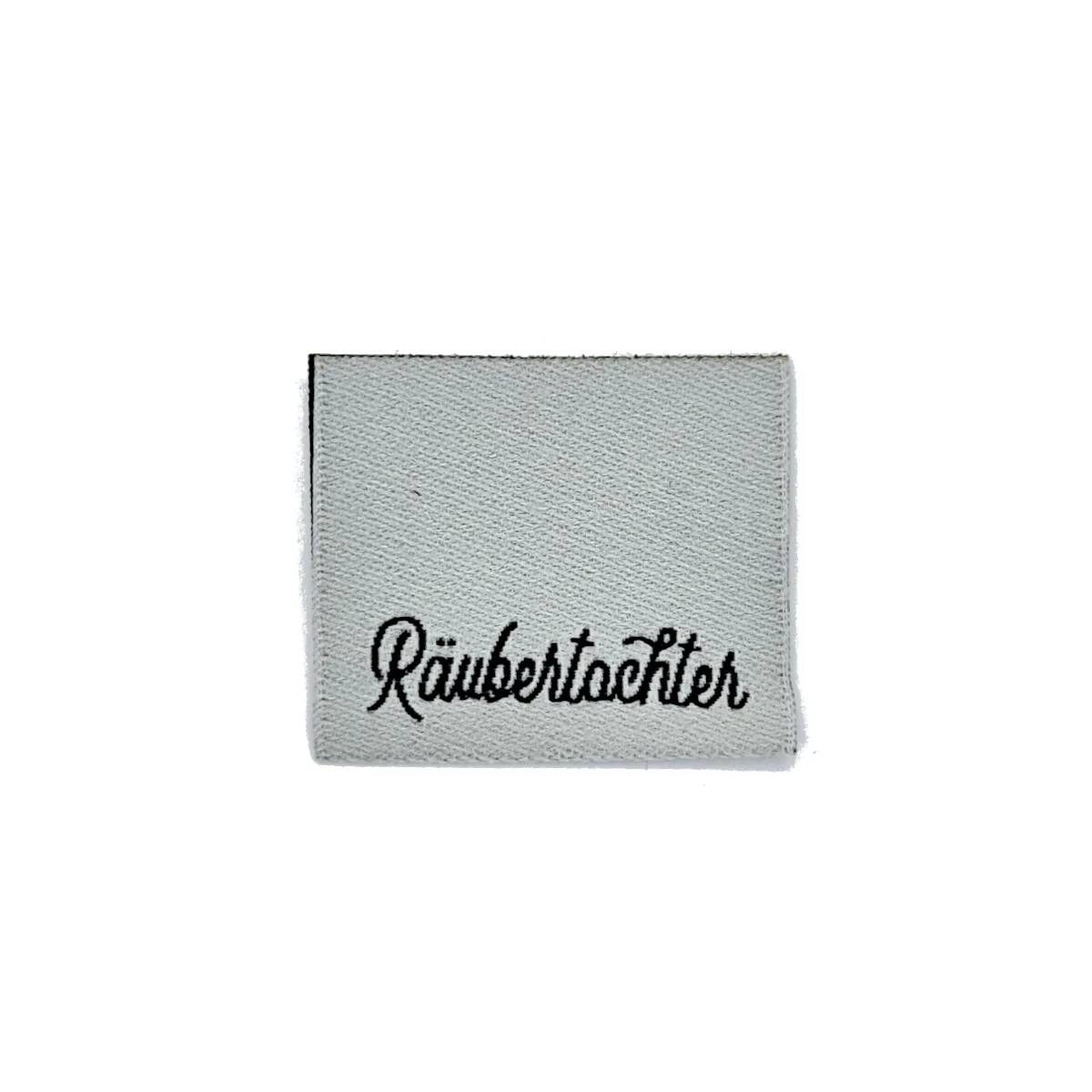 Weblabel Räubertochter grau, Nahaufnahme im Sortiment der Stoffkönigin